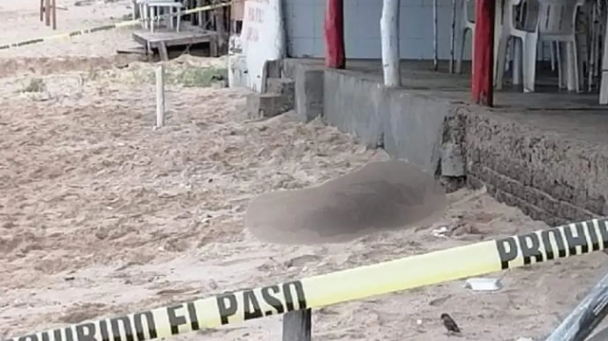 hombre muerto en la playa de Mazatlán